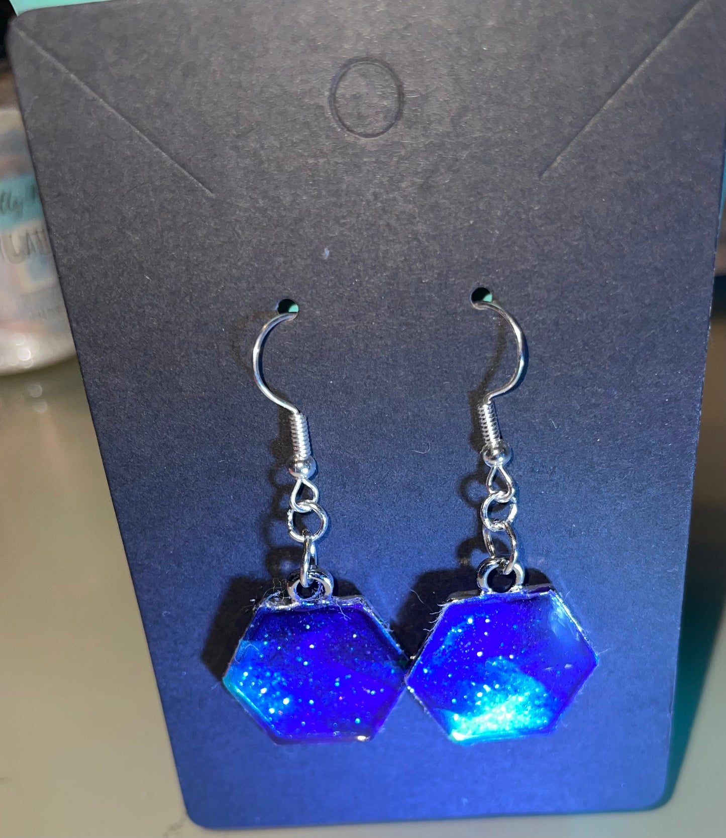 Handmade glittered earrings perfect for that night out or even a day event.