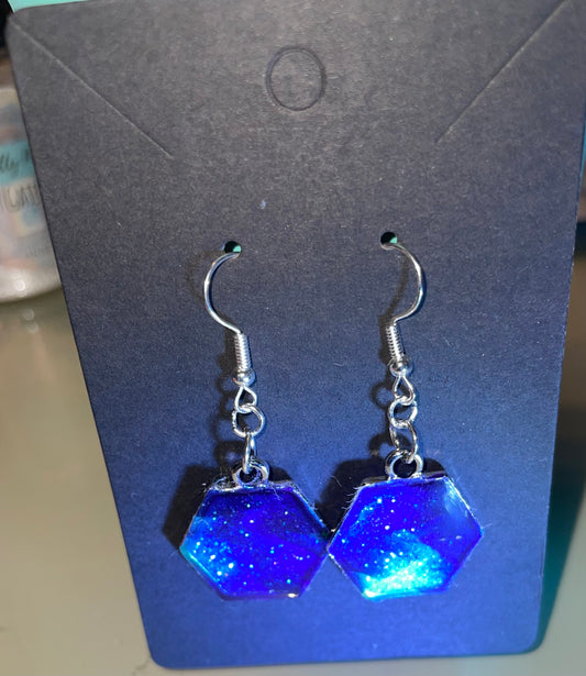 Handmade glittered earrings perfect for that night out or even a day event.