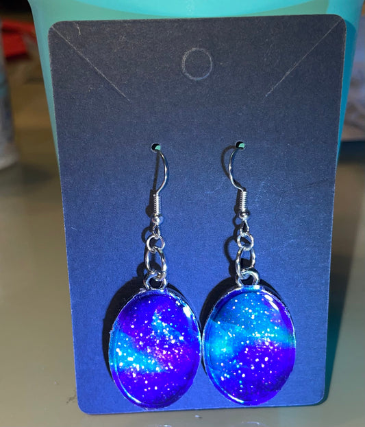 Handmade glittered earrings. These would be perfect for an evening out.
